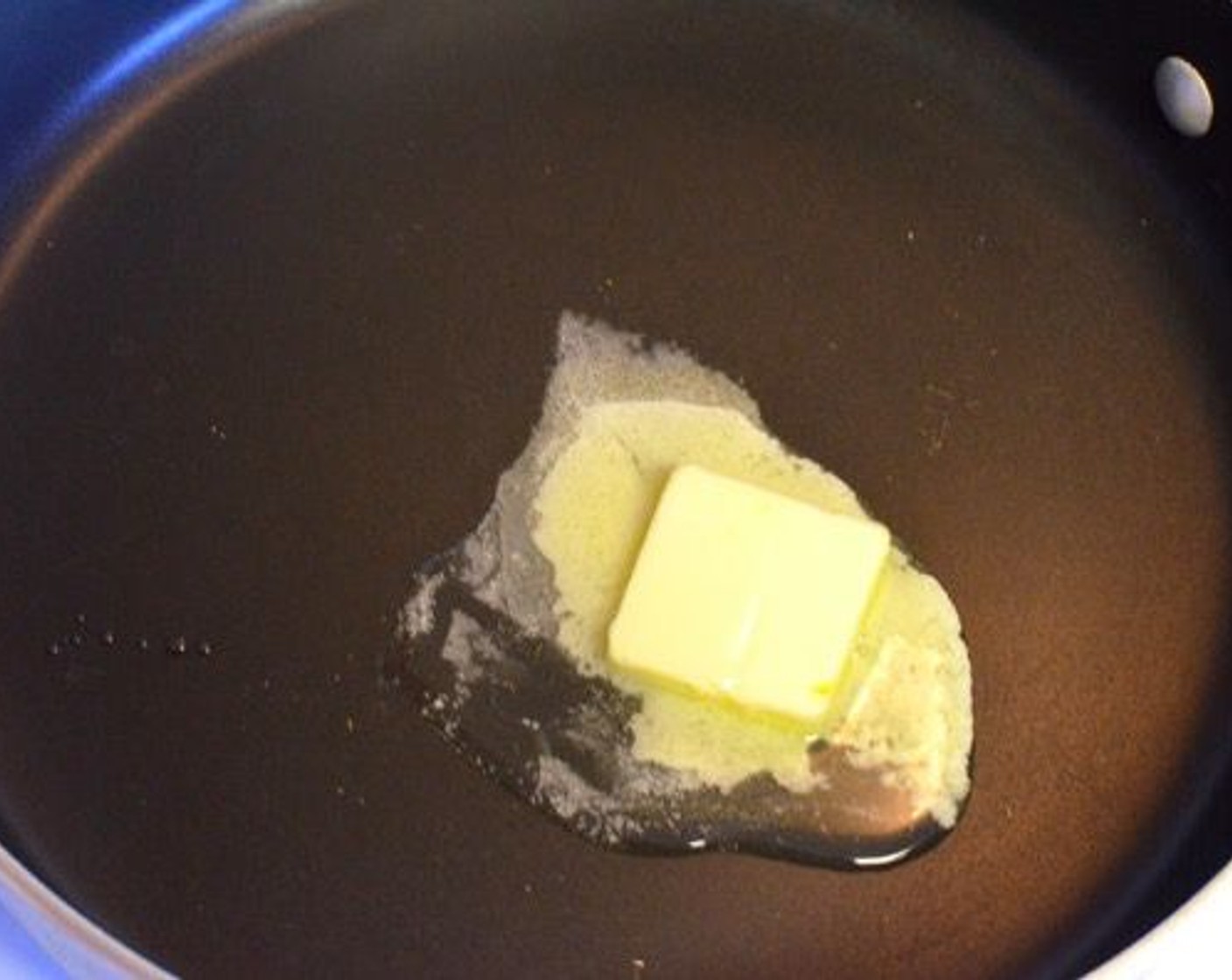 Schritt 6 Butter (2 Esslöffel) in einer heissen Pfanne schmelzen lassen.