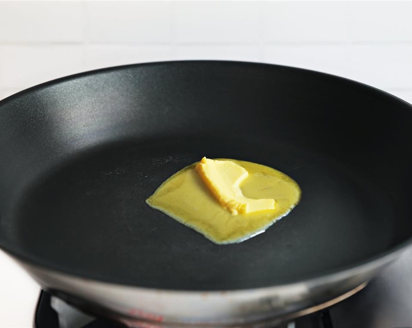 Schritt 5 Eine Pfanne bei mittlerer Hitze erhitzen und Butter (2 Esslöffel) hinzufügen.