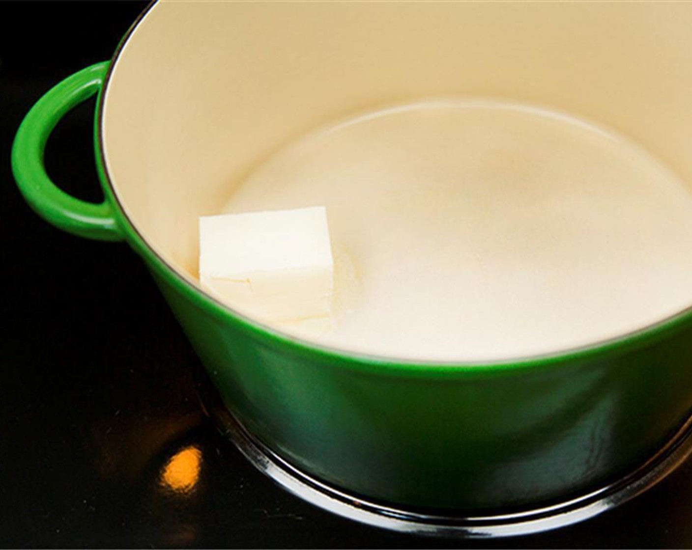 Schritt 1 Butter (90 ml) in einem grossen Dutch Ofen (Gusseisentopf) bei mittlerer Hitze schmelzen.