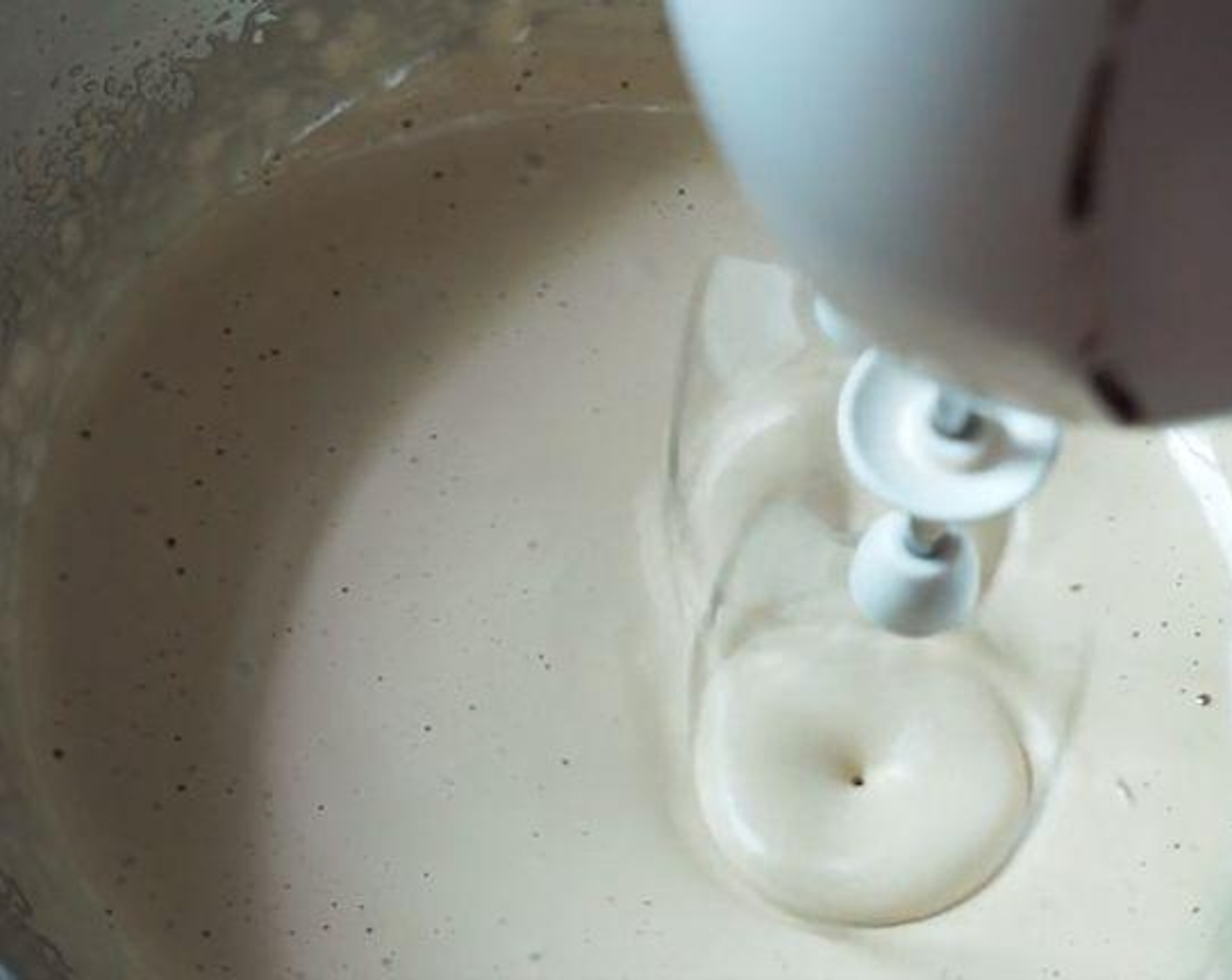 Schritt 2 Milch (80 ml) hinzufügen und gut vermischen.